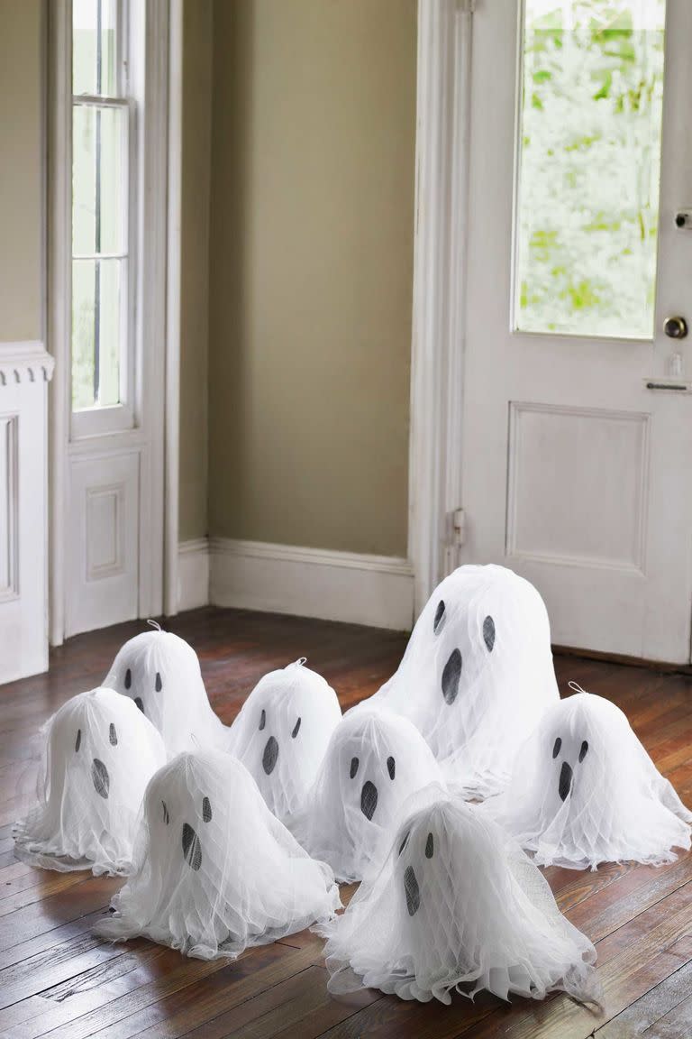 <p>Follow a few simple steps to transform tissue paper bells into scary ghosts for your dining table. </p><p><a class="link " href="https://www.amazon.com/Medium-Bridal-Honeycomb-Wedding-Engagement/dp/B004BPPLH2/ref=sr_1_2?tag=syn-yahoo-20&ascsubtag=%5Bartid%7C10055.g.33437890%5Bsrc%7Cyahoo-us" rel="nofollow noopener" target="_blank" data-ylk="slk:SHOP TISSUE PAPER BELLS;elm:context_link;itc:0;sec:content-canvas">SHOP TISSUE PAPER BELLS</a></p>