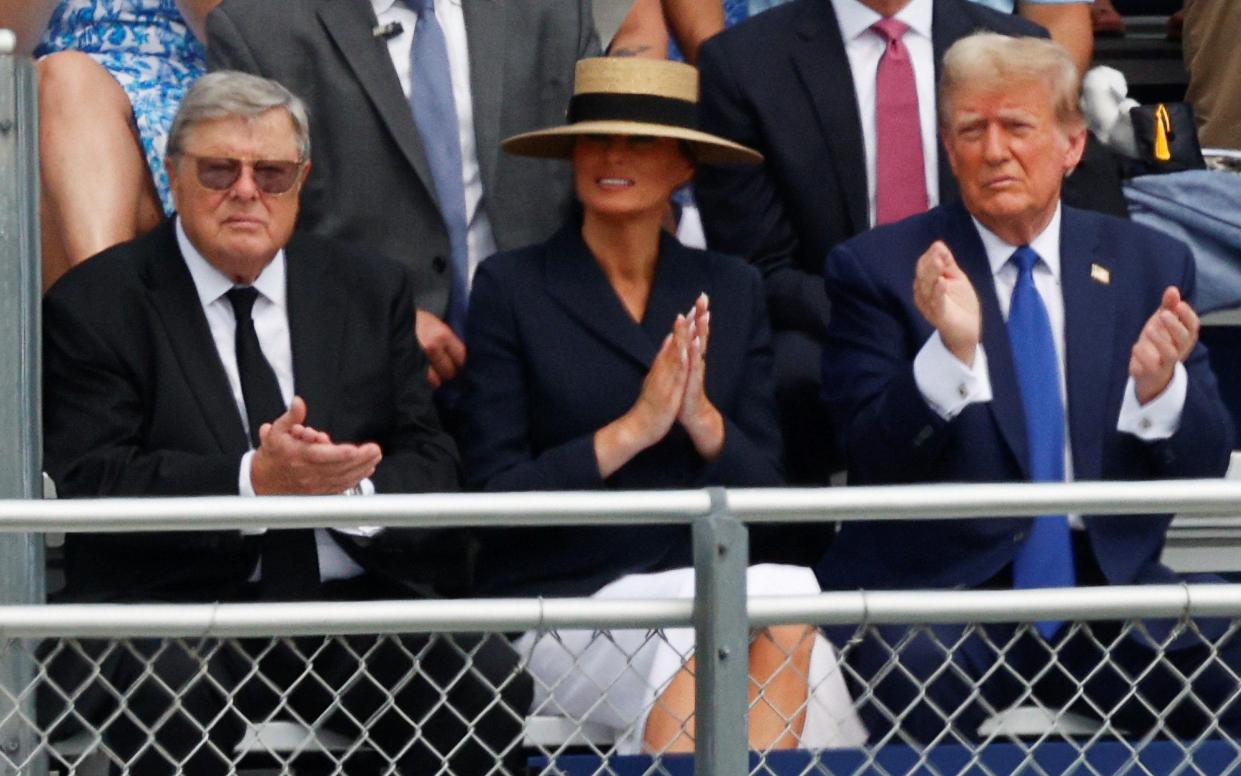 The former president had a front row seat at the event along with Melania Trump