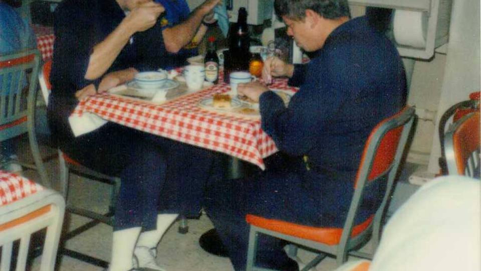 In 1988, forks began to disappear in the USS Nevada, thanks to a prank cooked up by David Chetlain and partner in mischief Jim Gover. From left: Carl Brisson, Jim George, and Wayne Alderman. (Photo courtesy of David Chetlain)