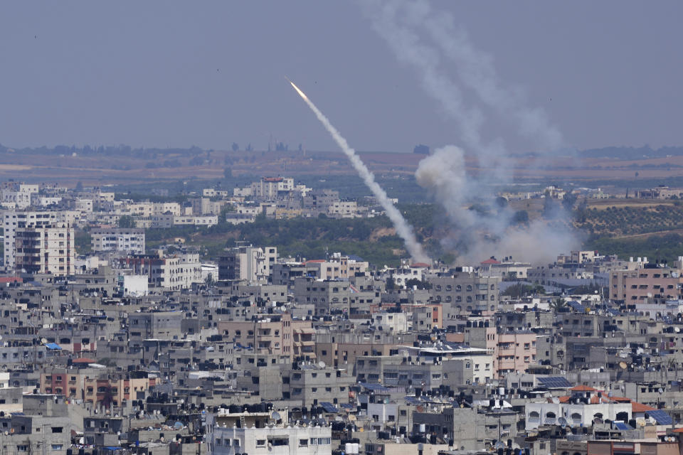 Rockets are launched from the Gaza Strip towards Israel, in Gaza City, Wednesday, May 10, 2023. Israeli aircraft struck targets in the Gaza Strip for a second straight day on Wednesday, killing at least one Palestinian and pushing the region closer toward a new round of heavy fighting. (AP Photo/Adel Hana)