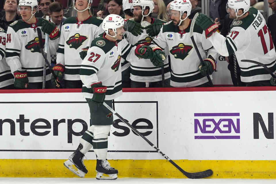 Minnesota Wild center Jacob Lucchini celebrates his goal against the Chicago Blackhawks during the first period of an NHL hockey game, Wednesday, Feb. 7, 2024, in Chicago. (AP Photo/Erin Hooley)