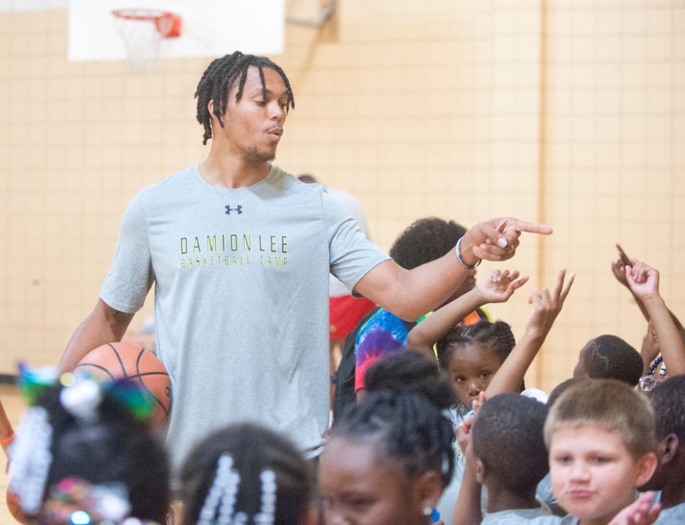 Damion Lee picks sides for a scrimmage during his basketball camp in the Chestnut Street YMCA gymnasium.
25 July 2019