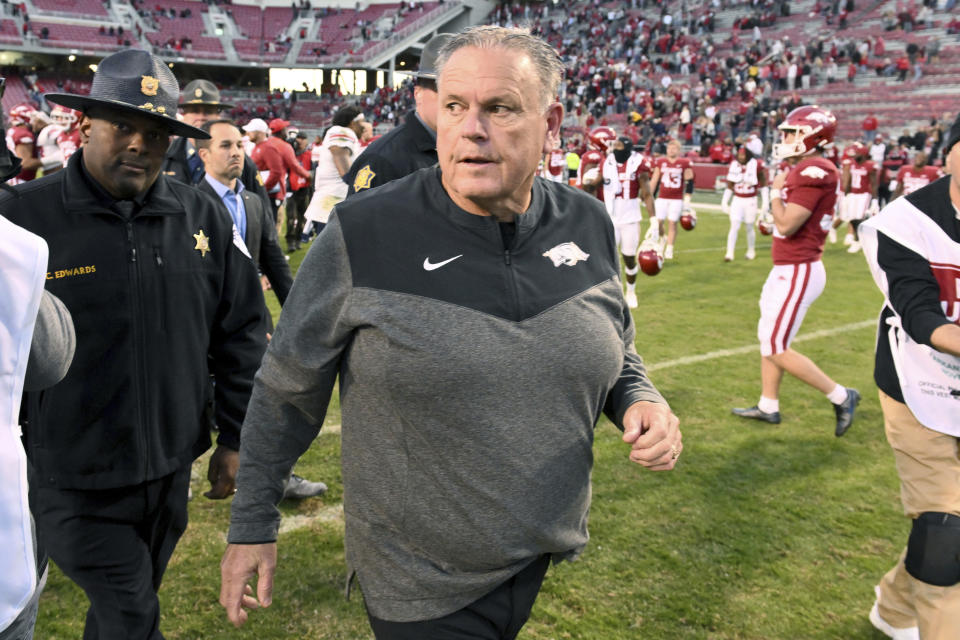 Arkansas coach Sam Pittman heads to the locker room after losing to Liberty in an NCAA college football game Saturday, Nov. 5, 2022, in Fayetteville, Ark. (AP Photo/Michael Woods)