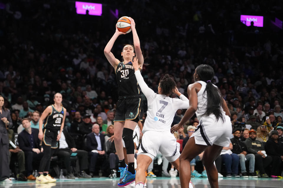 September 29, 2024; Brooklyn, New York, USA; New York Liberty forward Breanna Stewart (30) shoots a jump shot over Las Vegas Aces forward Alysha Clark (7) during game one of the 2024 WNBA Semifinals at Barclays Center. Mandatory attribution: Gregory Fisher-Imagn Images