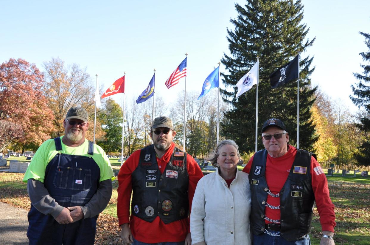 Bob Rinehart, sexton at Grandview Cemetery in Sebring, and American Legion Riders Sebring Post 76 members Dwayne Seabolt, Janet Baddeley and Ed Baddeley stand in front of a new veterans memorial at Grandview Cemetery on Friday, Nov. 3, 2023.