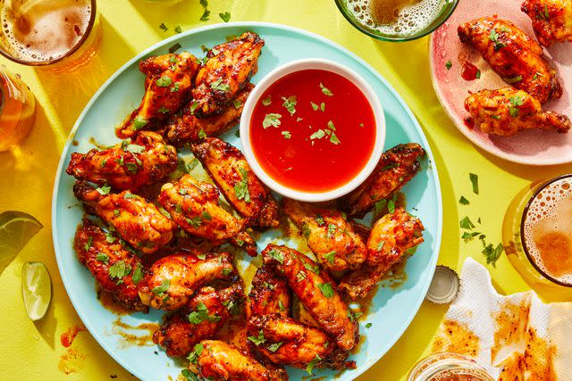 Photo by Antonis Achilleos / Food Styling by Ruth Blackburn / Prop Styling by Christina Daley Air Fryer Lemon Pepper Chicken Wings with Hot Honey Glaze