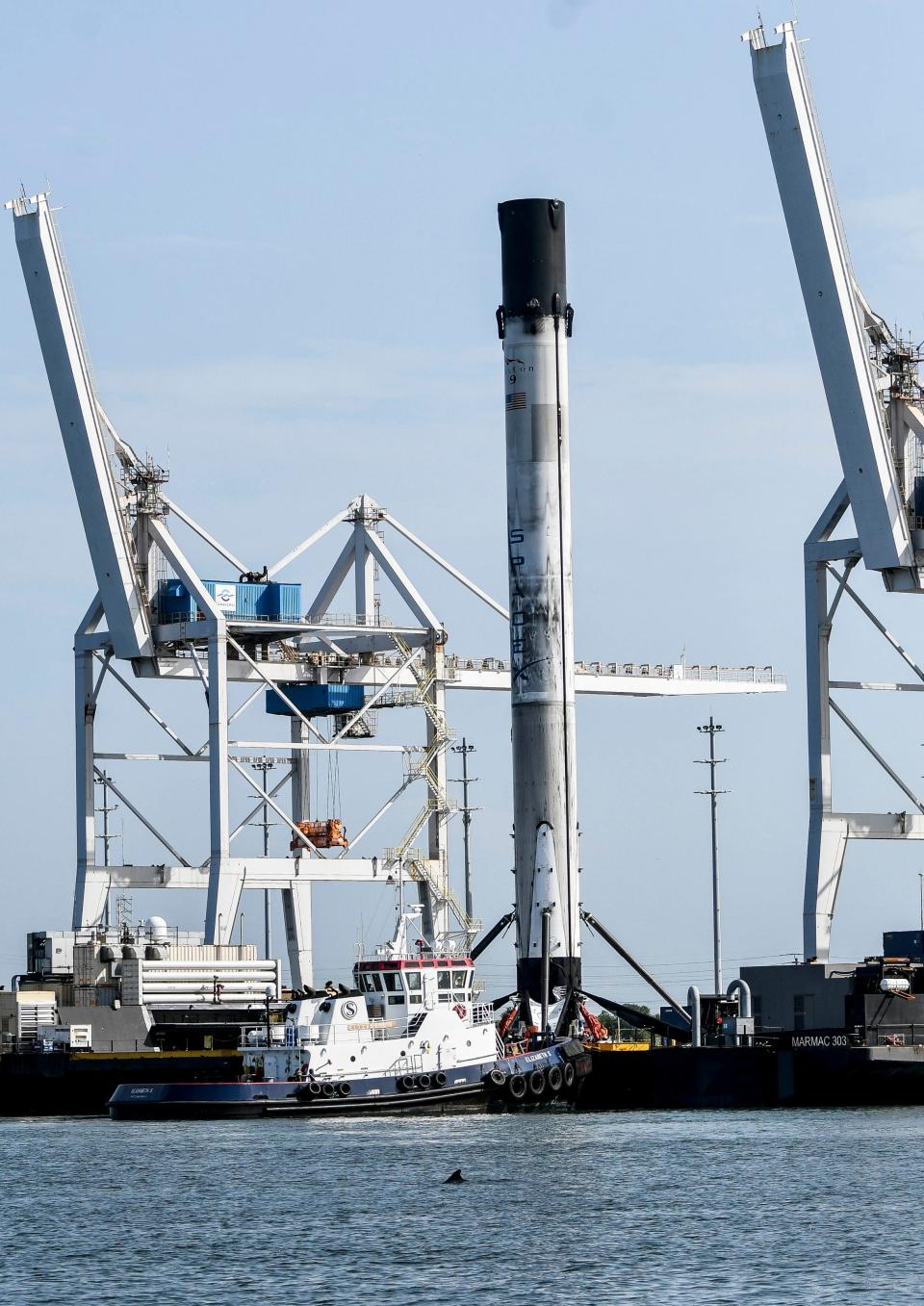 SpaceX booster B1060.1 is brought into Port Canaveral aboard the SpaceX drone ship Just Read the Instructions on July 4, 2020.