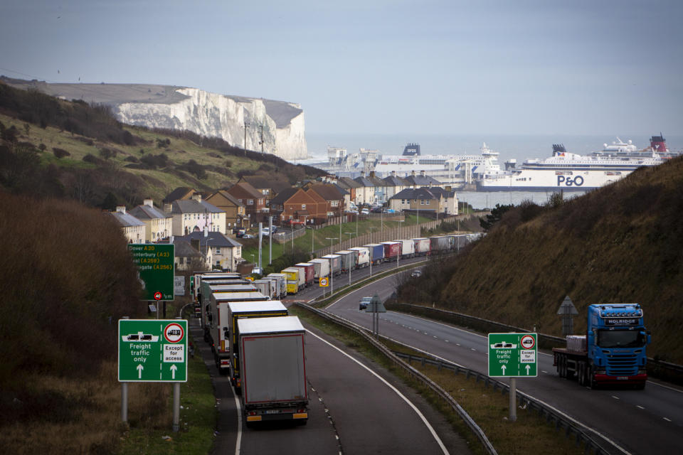 Image: Freight trucks line up on the M20 motorway near Dover port in December 2020 (Andrew Aitchison / Getty Images file)