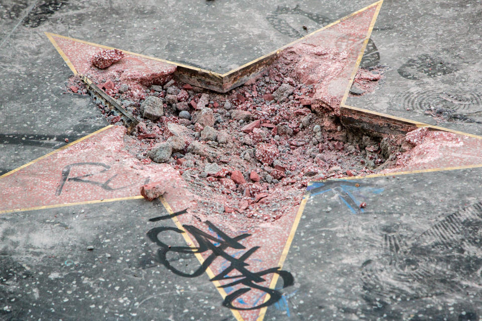 The remains of President Donald Trump's Hollywood Walk of Fame star&nbsp;are seen after it was vandalized early Wednesday morning by a man with a pickax. (Photo: Gabriel Olsen/Getty Images)