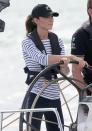 <p>Kate certainly feels comfortable steering a boat. The Duchess wore traditional sailing stripes to helm an America's Cup yacht, racing Prince William in Auckland Harbour. </p>