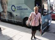 Parti Quebecois leader Pauline Marois arrives at a campaign stop in Montreal, March 26, 2014. Quebec voters will go to the polls in a provincial election April 7. REUTERS/Christinne Muschi(CANADA - Tags: POLITICS)