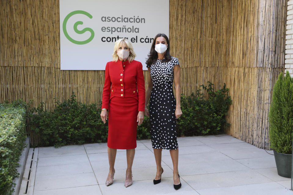 U.S. first lady Jill Biden, left, and Spain's Queen Letizia pose during a visit to the Spanish Association Against Cancer center ahead of the NATO Summit, in Madrid, Spain, Monday June 27, 2022. (Nacho Doce/Pool Photo via AP)