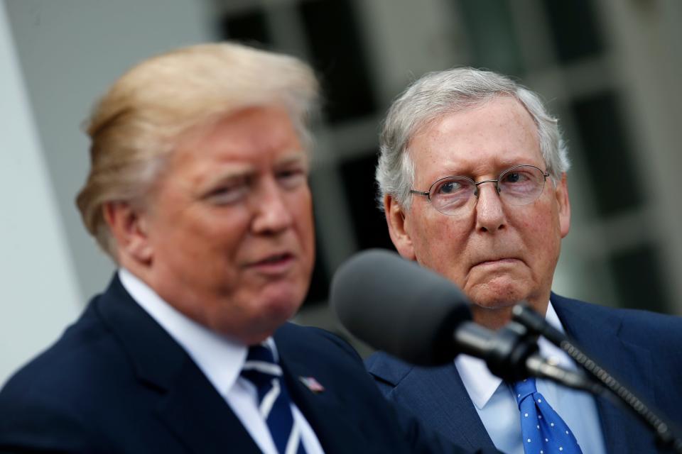 President Donald Trump speaks as he stands next Senate Majority Leader Mitch McConnell of Ky., after their meeting at the White House, Monday, Oct. 16, 2017, in Washington. (