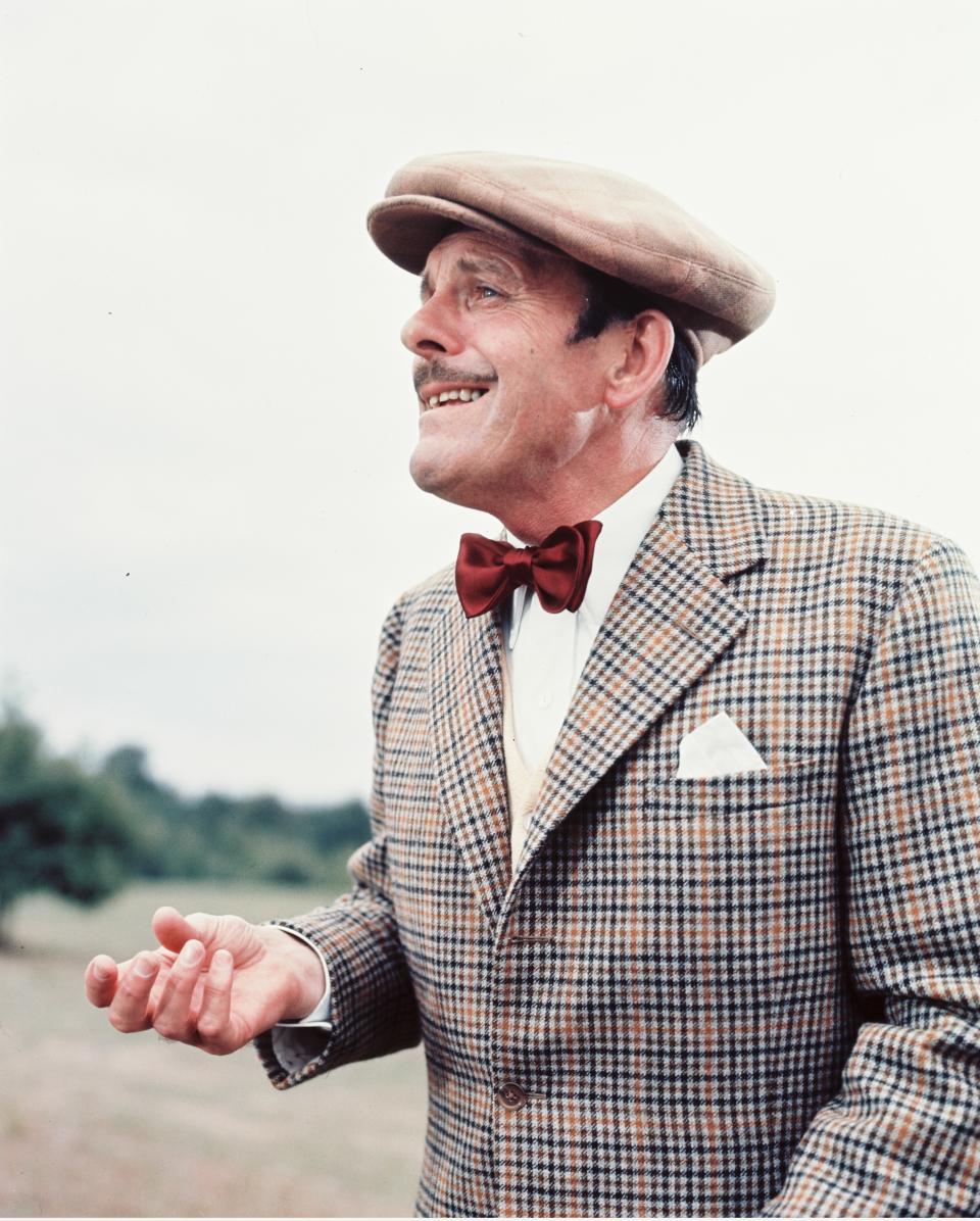 Terry-Thomas (1911-1990), British actor, wearing a tweed jacket, a white shirt and a dark red bow tie with a flat cap in a publicity still issued for the film, 'Monte Carlo or Bust', 1969. The comedy, directed by Ken Annakin (1914-2009), starred Terry-Thomas as 'Sir Cuthbert Ware-Armitage'. (Photo by Silver Screen Collection/Getty Images)