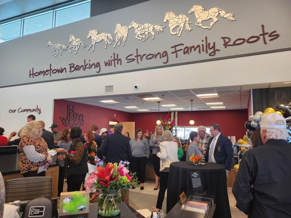 Community members attend the grand opening of First National Bank's new Amarillo/Canyon location on Thursday.