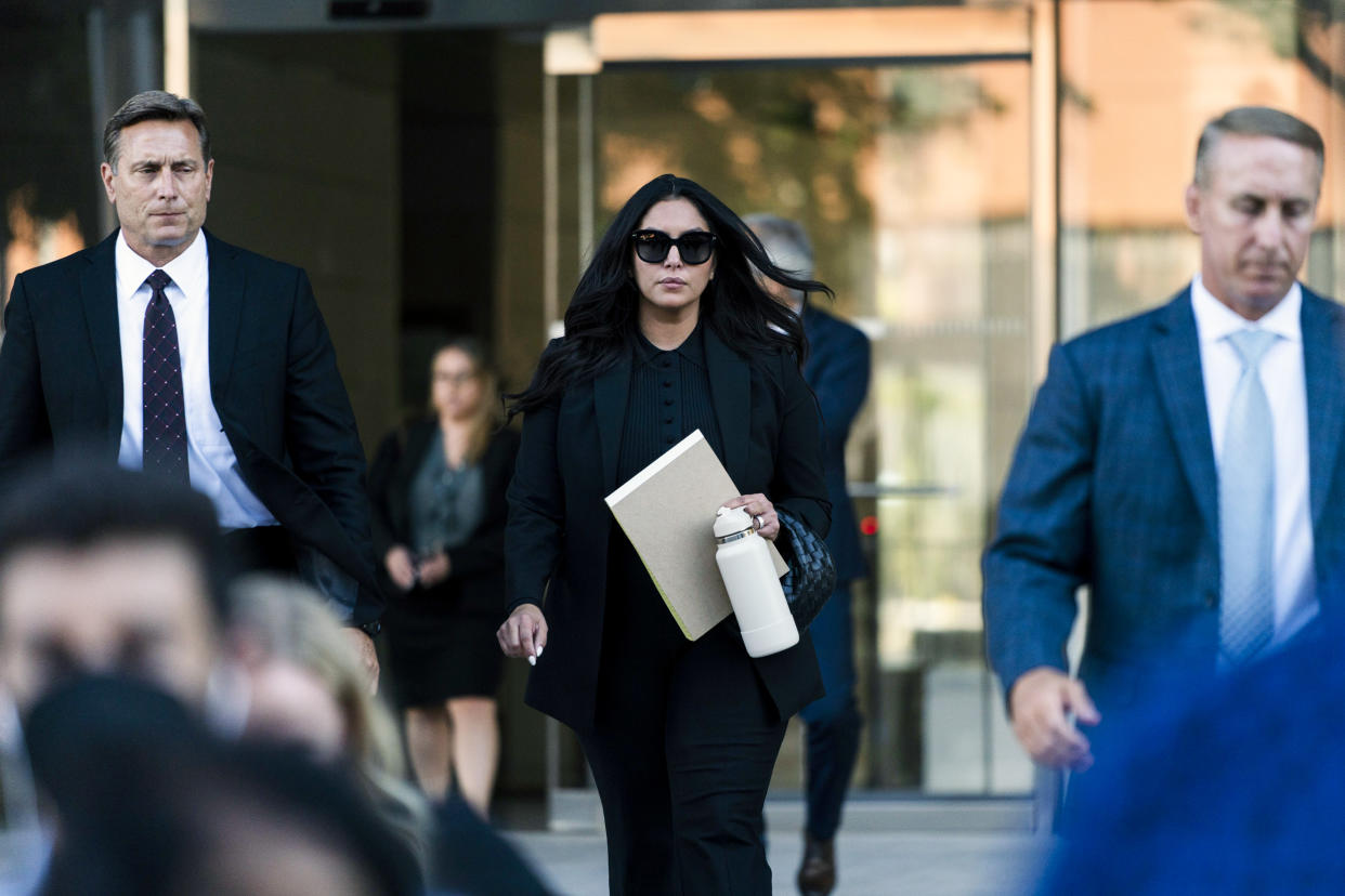 Image: Vanessa Bryant, center, the widow of Kobe Bryant, leaves a federal courthouse  on  Aug. 10, 2022 in Los Angeles, Calif. (Jae C. Hong / AP file)