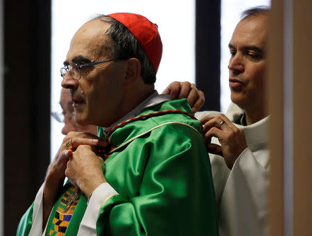 FILE PHOTO: French Archbishop Philippe Barbarin before a ceremony to consecrate the new parish of Saint-Philippe de Venissieux, near Lyon, France, September 30, 2018. REUTERS/Emmanuel Foudrot/File Photo