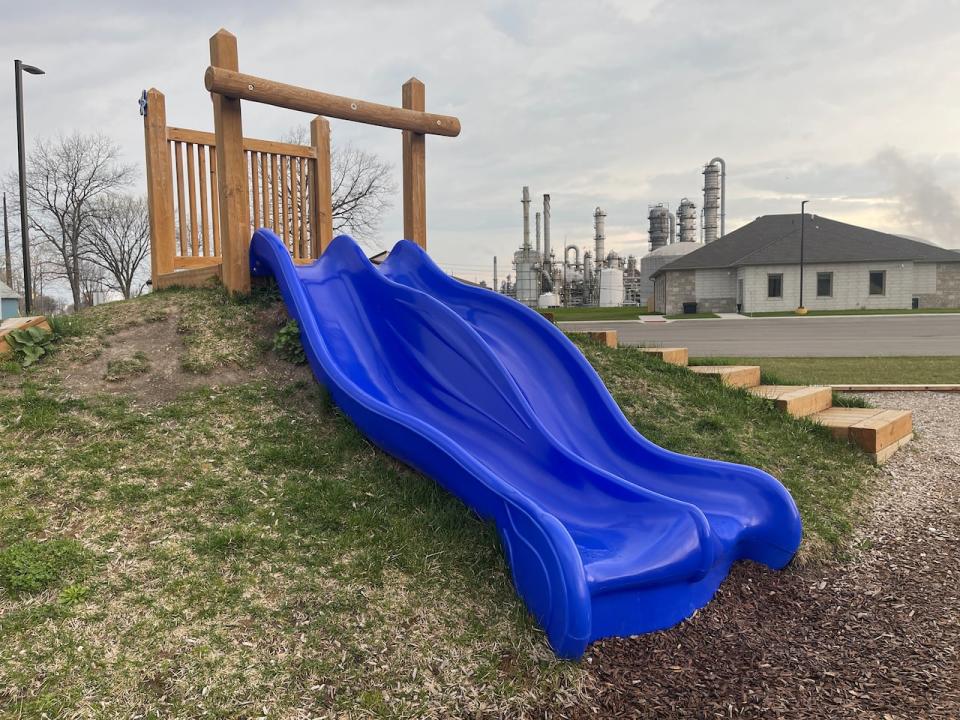 An Aamjiwnaang daycare playground sits next to INEOS Styrolution, in Sarnia, Ont.