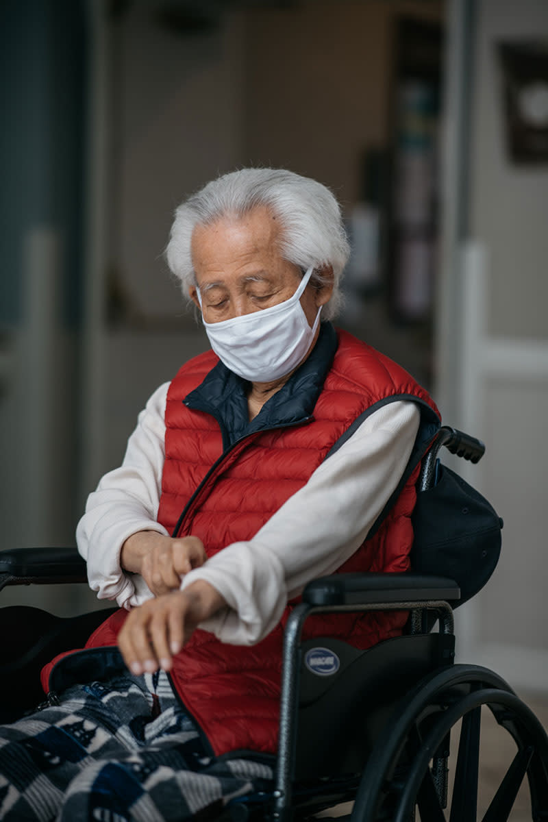 Noh Park, 92, prepares for his daughter's Father's Day visit at the Alexandria Care Center in Los Angeles. | Isadora Kosofsky for TIME