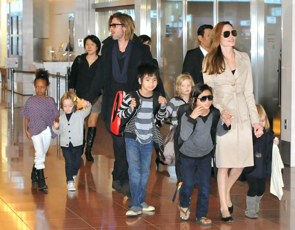 <b>And on to the engagements...<br><br> Angelina Jolie and Brad Pitt.</b><br> Five years and six kids later, the Hollywood pair decided it was time to make it official. Brad Pitt popped the question with a custom designed ring this April. "It is a promise for the future, and their kids are very happy. There's no date set at this time," a spokesperson confirmed.