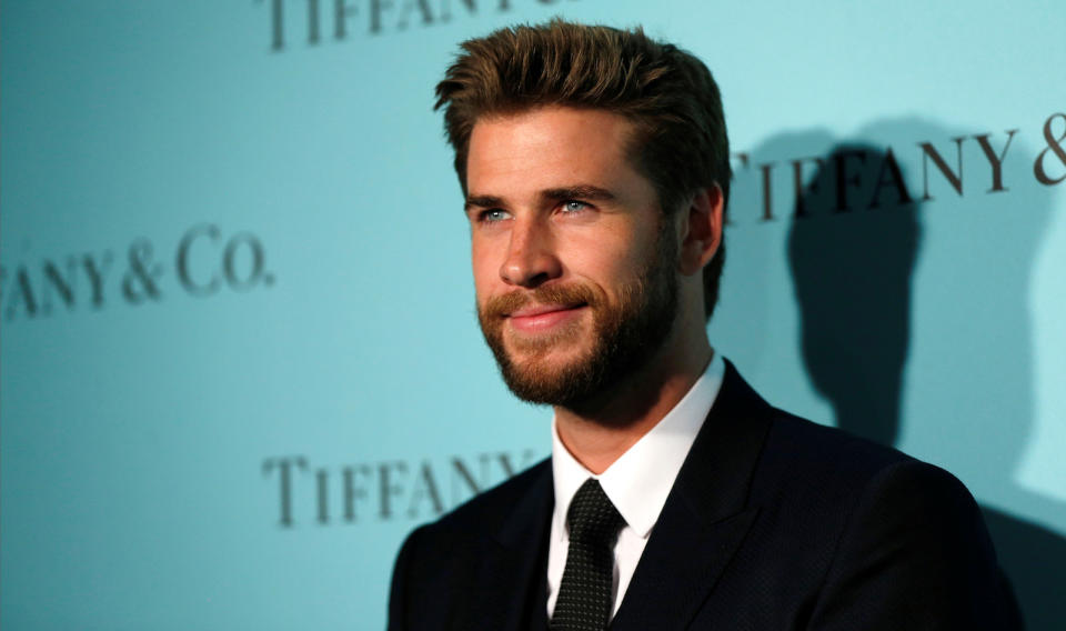 Actor Liam Hemsworth poses at a reception for the re-opening of the Tiffany & Co. store in Beverly Hills, California U.S., October 13, 2016.   REUTERS/Mario Anzuoni - S1BEUGWHOKAA