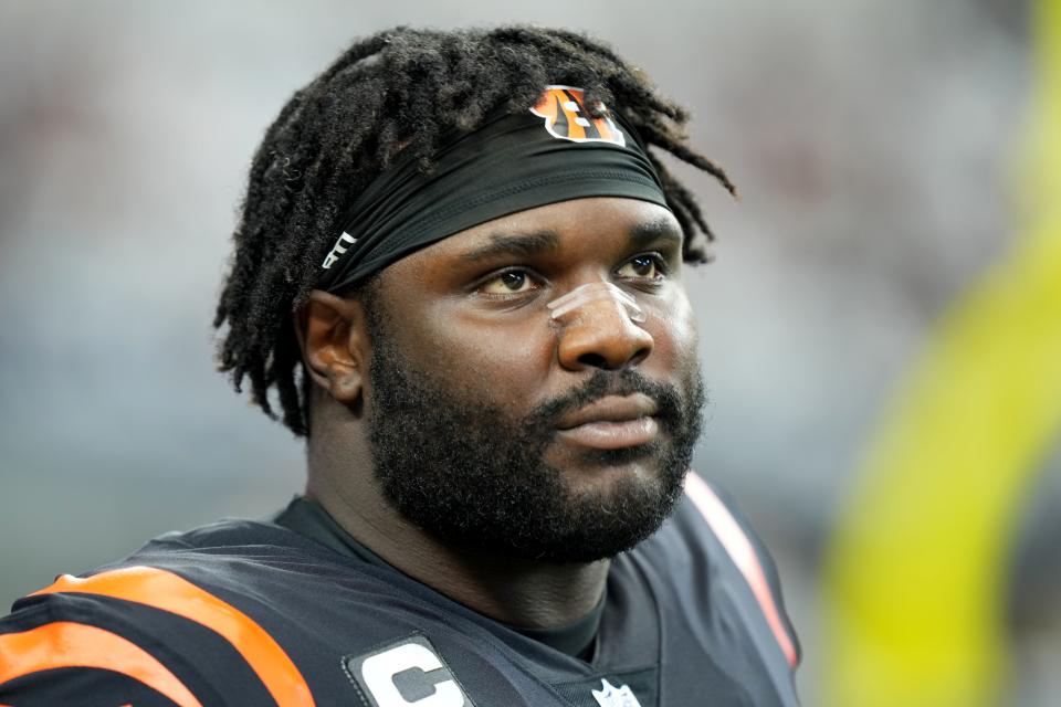 Cincinnati Bengals defensive tackle D.J. Reader is taking a wait-and-see approach to whether he'll play Thursday against the Miami Dolphins.