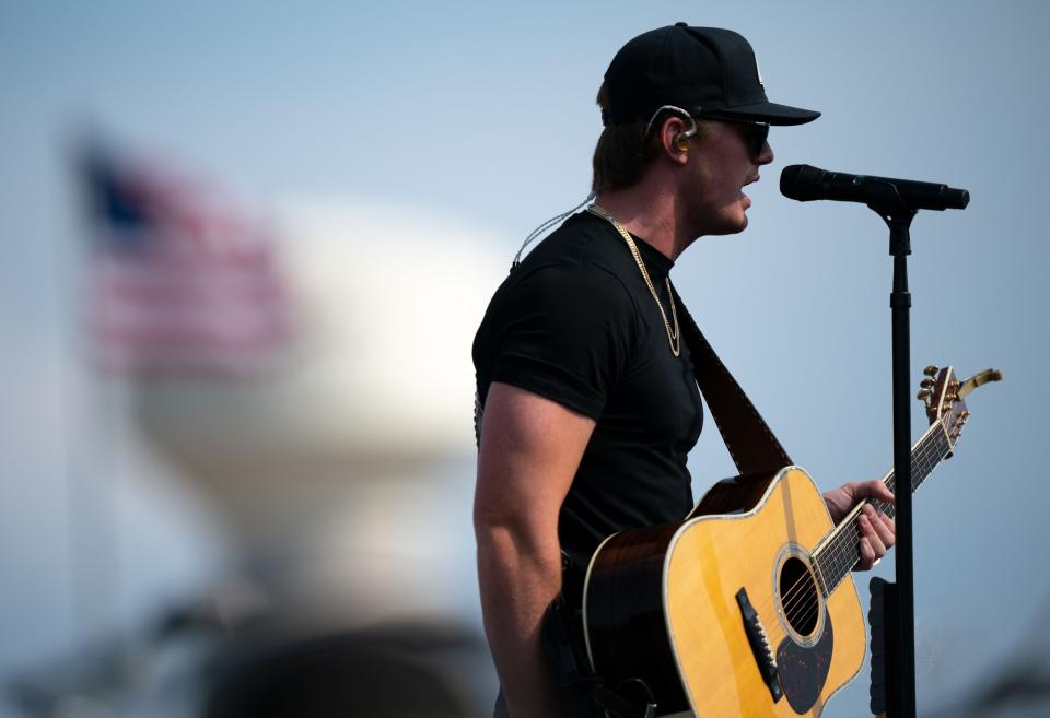 Parker McCollum performs before the NASCAR Ally 400 at Nashville Superspeedway in Lebanon, Tenn., Sunday, June 25, 2023.