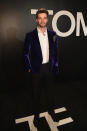 Miley Cyrus’s boyfriend and political scion looks sharp in a unique purple blazer.