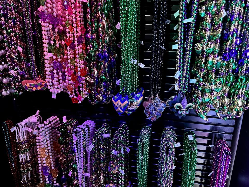 The elaborate beads sold inside the Mardi Gras Tribute Store are a tick above the standard colorful ones thrown during the parade. (Photo: Terri Peters)