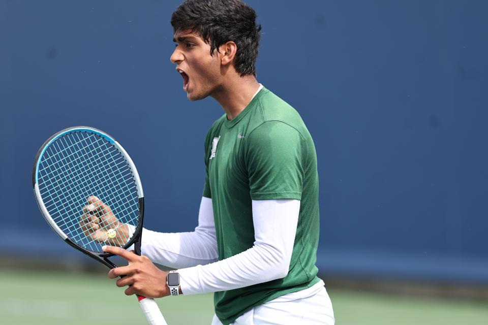 Mason doubles player Akshay Joshi reacts during their doubles match against Sycamore at the Lindner Family Tennis Center in Mason, Saturday, May 28, 2022.