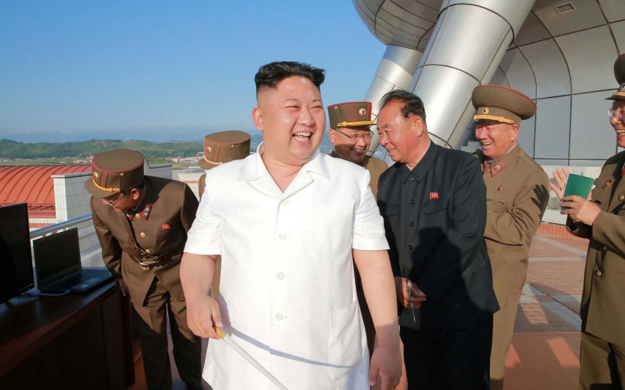 North Korean leader Kim Jong-Un inspects a test-fire of a new-type ground-to-sea cruise rocket - AFP