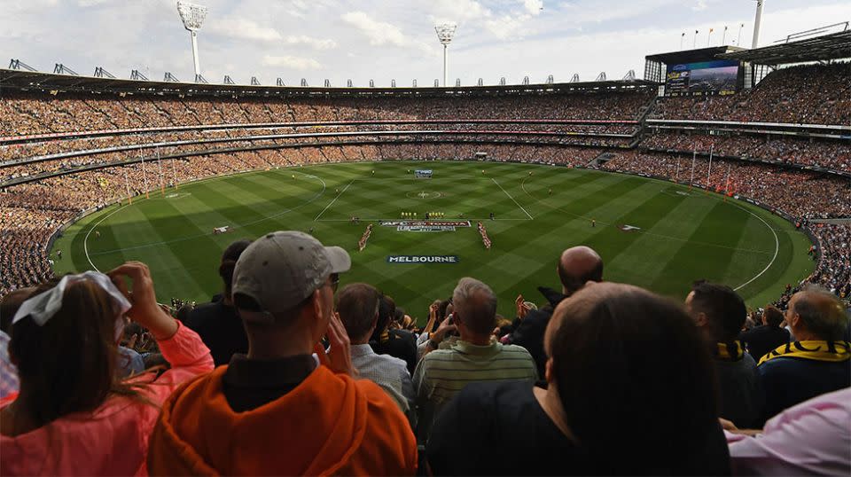 AFL fans who attended the Tigers' victory over GWS have been warned after one fan unknowingly atteded the game infected with measles. Source: Getty