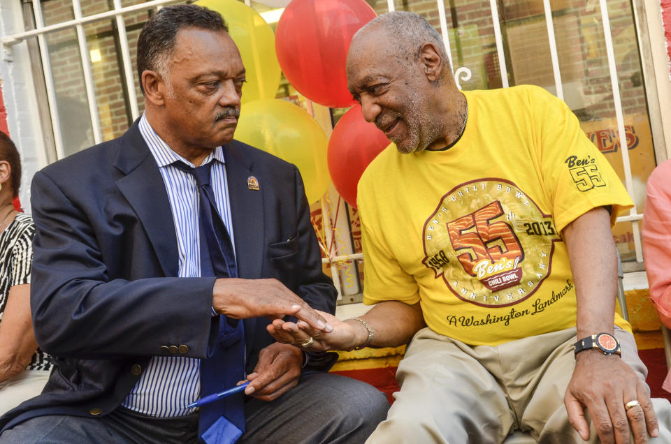 WASHINGTON, DC - AUGUST 22: Jesse Jackson and Bill Cosby speak during the 55th Anniversary of Ben's Chili Bowl on August 22, 2013 in Washington, DC. (Photo by Kris Connor/Getty Images)