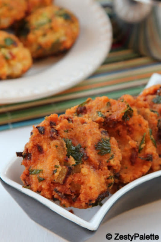 <p>Foodomania</p><p>Lentils are soaked and ground, and spruced up with commonly used spices and deep fried to make these delicious Masala Vada.</p><p><strong>Get the recipe: <a href="https://foodomania.com/masala-vadai/" rel="nofollow noopener" target="_blank" data-ylk="slk:Masala Vada;elm:context_link;itc:0;sec:content-canvas" class="link ">Masala Vada</a></strong></p>