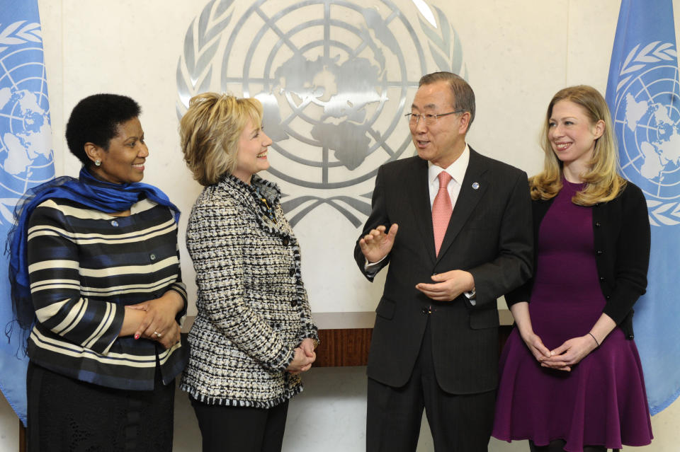 In this photo provided by the United Nations, former U.S Secretary of State Hillary Rodham Clinton, center left, meets with United Nations Secretary General Ban Ki-moon, center right, at United Nations Headquarters, Tuesday, Feb. 4, 2014, as UN Women Executive Director Phumzile Mlambo-Ngcuka, left, and Chelsea Clinton look on. (AP Photo/United Nations, Evan Schneider)