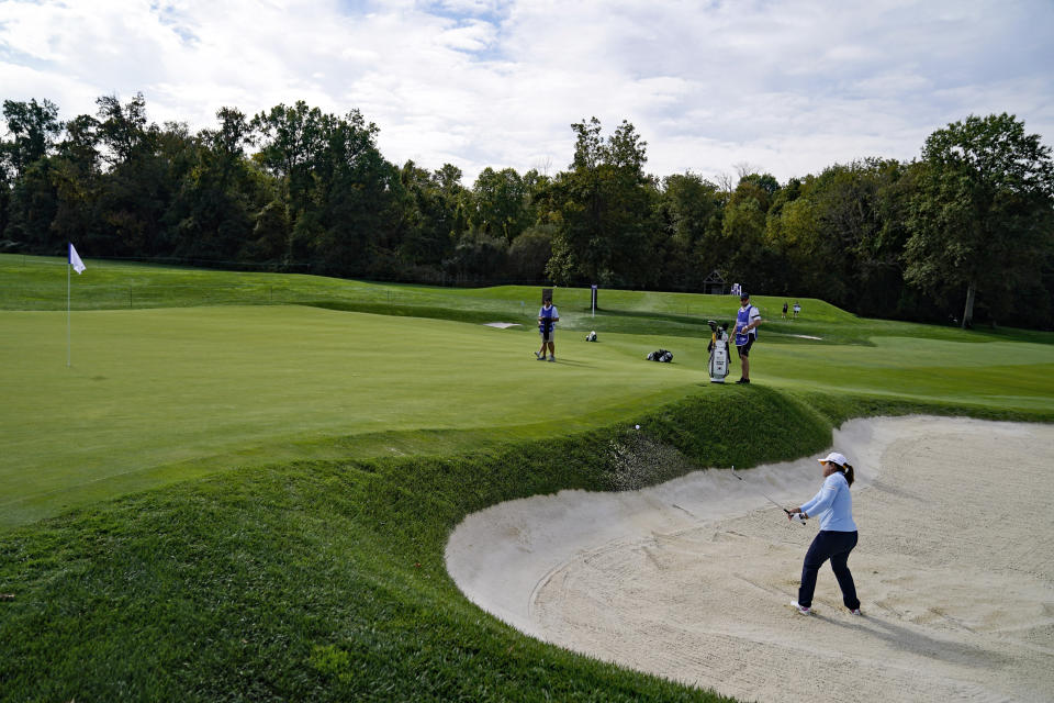 Inbee Park, of South Korea, hits from a sand trap onto the 14th green in the second round of the Cognizant Founders Cup LPGA golf tournament, Friday, Oct. 8, 2021, in West Caldwell, N.J. (AP Photo/John Minchillo)