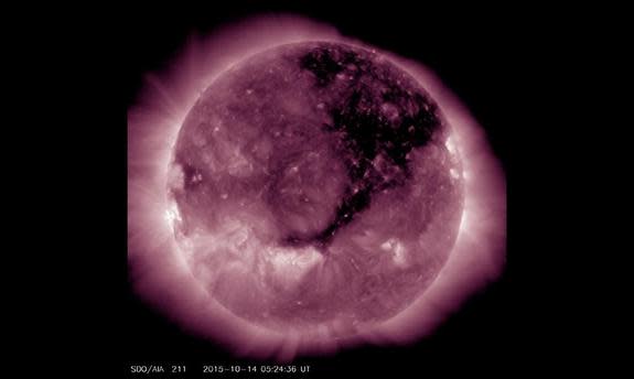 A Solar Dynamics Observatory image published by the National Oceanic Atmospheric Administration reveals the huge coronal hole as it was yesterday. Continuing its march solar west (to the right), the hole is still releasing an extra-fast solar w