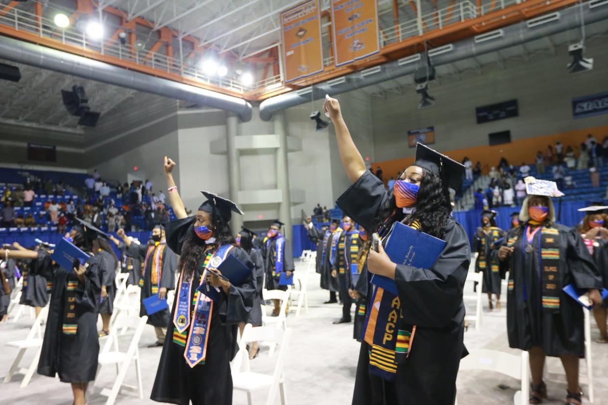 Savannah State University graduates celebrate after receiving their diplomas during a past commencement ceremony for the College of Liberal Arts and Social Sciences.