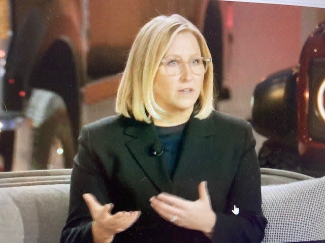 Lisa Drake, vice president of EV industrialization for Ford Model e, takes part in a town hall discussion with reporters on Wednesday, March 2, 2022 in Dearborn. The company revealed its plan to separate the gas and electric vehicle operations into divisions called Ford Blue and Ford Model e.