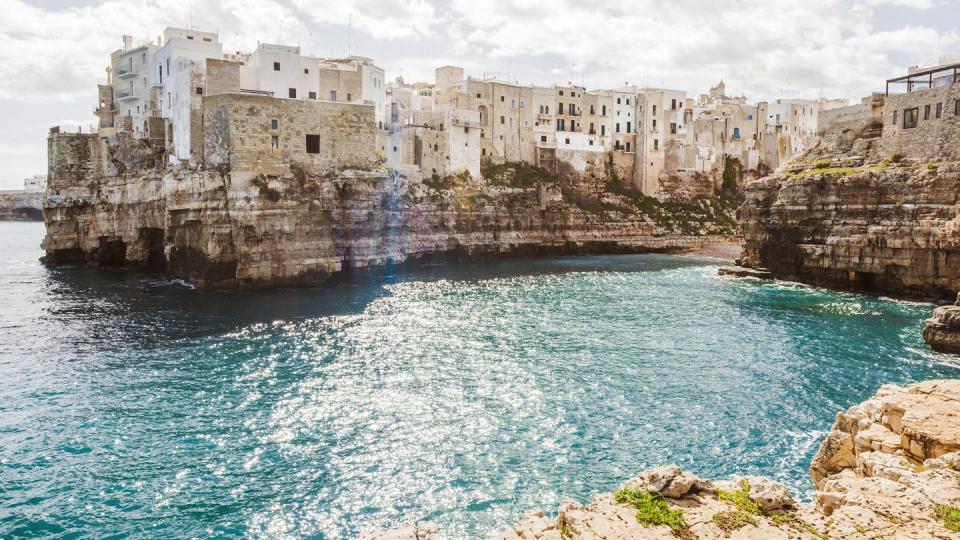 italy, puglia, polognano a mare, view to historic old town