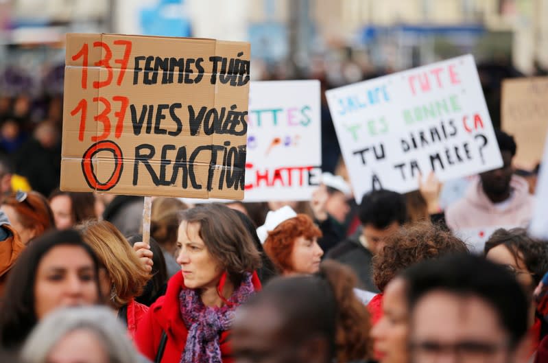 People attend a demonstration against femicide and violence against women in Marseill