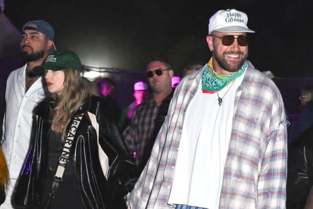 Taylor Swift and Travis Kelce at Neon Carnival held during the Coachella Music and Arts Festival on April 13, 2024 in Thermal, California.  - Credit: Gilbert Flores/WWD/Getty Images