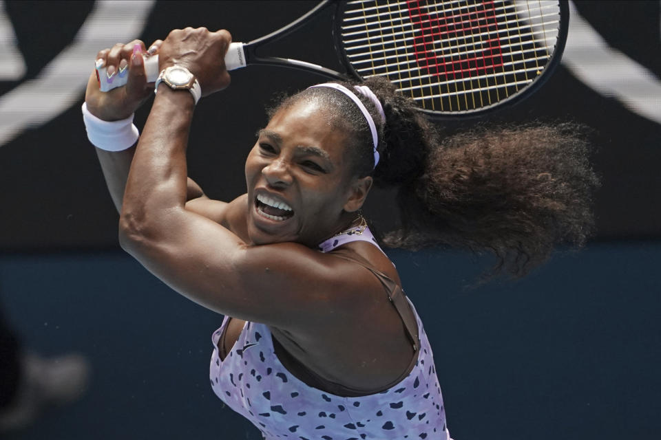 FILE - In this Jan. 24, 2020, file photo, Serena Williams of the U.S. plays a shot to China's Wang Qiang in their third round singles match at the Australian Open tennis championship in Melbourne, Australia. A coronavirus-forced quarantine has mostly finished in Melbourne and Adelaide. That will mean most of the world’s top tennis players will go from two of the quietest weeks of their lives in Australia to three of the busiest. It was a controversial start to the government-mandated quarantine ahead of the Australian Open beginning Feb. 8, 2021. (AP Photo/Lee Jin-man, File)