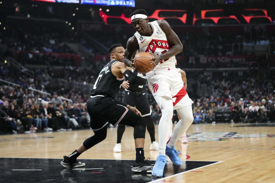 Toronto Raptors' Pascal Siakam (43) works around Los Angeles Clippers' Russell Westbrook (0) during first half of an NBA basketball game Wednesday, March 8, 2023, in Los Angeles. (AP Photo/Jae C. Hong)