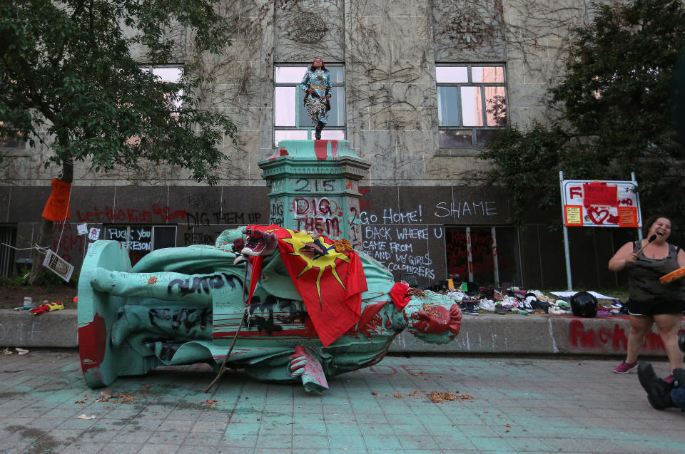 Photos: Statue of Egerton Ryerson at Toronto university toppled, won't be replaced