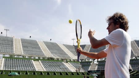 Sweden's team captain Mats Wilander hits the ball during a training session ahead of their quarter-final Davis Cup tennis match against Argentina in Buenos Aires, April 10, 2008. REUTERS/Marcos Brindicci