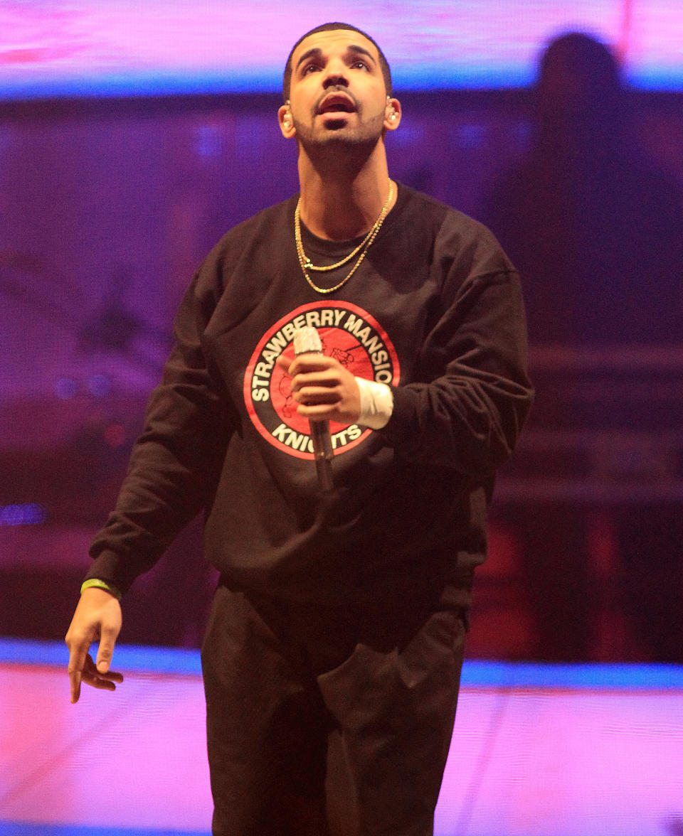 Rapper Drake performs in concert on the last date of his "Would You Like A Tour? 2013" at the Wells Fargo Center on Wednesday, Dec. 18, 2013, in Philadelphia. (Photo by Owen Sweeney/Invision/AP)