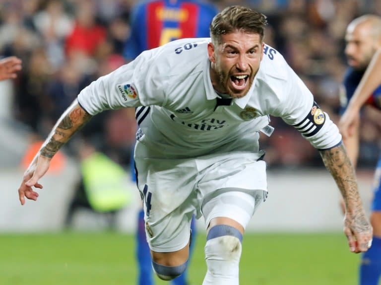 Real Madrid's defender Sergio Ramos celebrates after scoring a goal against Barcelona on December 3, 2016