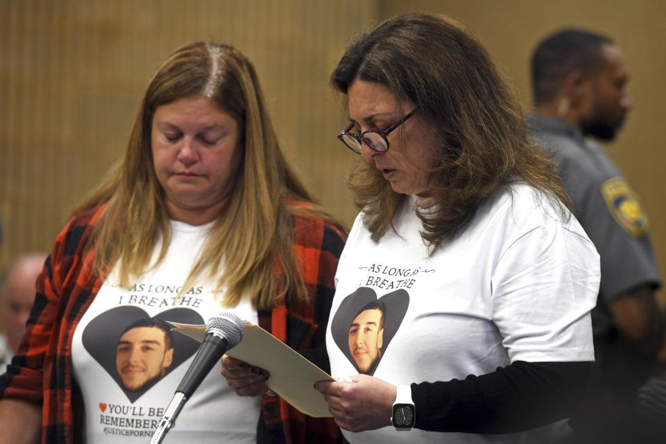 Michele Krasowksi, mother of Nicholas Eisele, speaks during a sentencing hearing for Peter Manfredonia in Milford Superior Court, in Milford, Conn., Wednesday, April 19, 2022. Manfredonia was sentenced to 55 years in prison Wednesday for the 2020 murder of Eisele, a former high school classmate, in Derby, and then kidnapping his girlfriend, Shannon Spies. (Ned Gerard/Hearst Connecticut Media via AP, Pool)