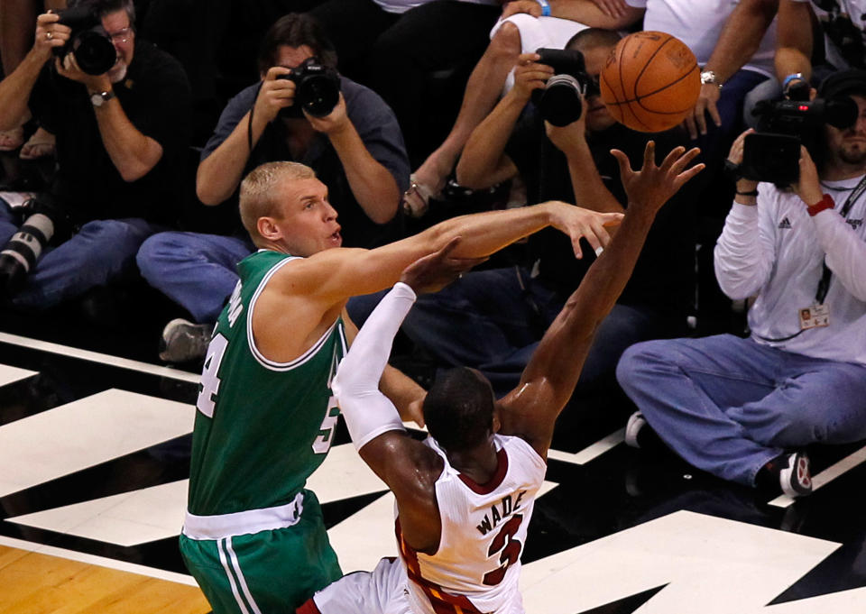 MIAMI, FL - JUNE 09: Greg Stiemsma #54 of the Boston Celtics attempts to block the shot of Dwyane Wade #3 of the Miami Heat in the first quarter in Game Seven of the Eastern Conference Finals in the 2012 NBA Playoffs on June 9, 2012 at American Airlines Arena in Miami, Florida. (Photo by J. Meric/Getty Images)